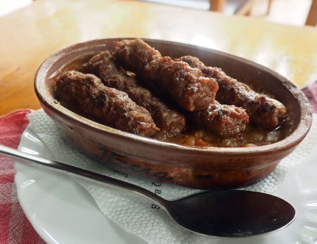 Tavče gravče with cevapi (Macedonian food)